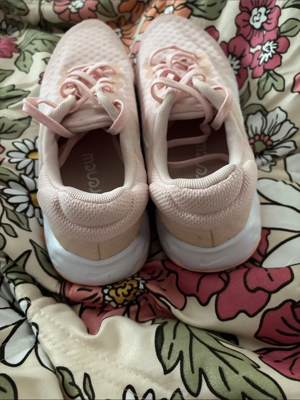 Nike Women’s Light Pink Mesh Running Sneakers with White Swoosh